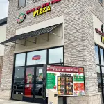 Get fast and delicious pizza at Taste of New York Pizzeria's drive-thru in Waukee.